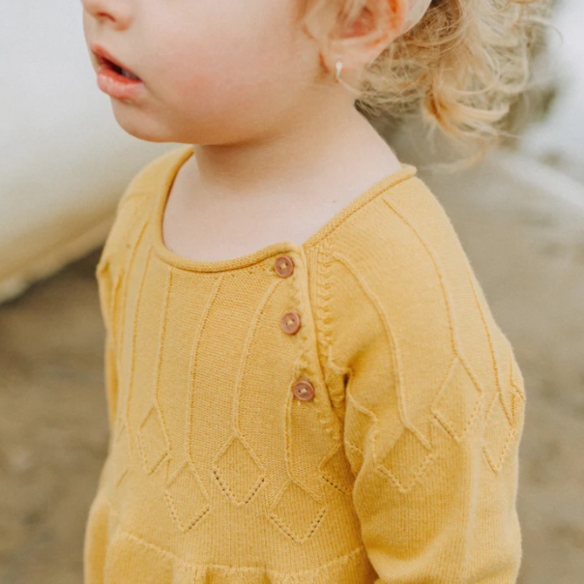 Yellow knit dress with long-sleeves