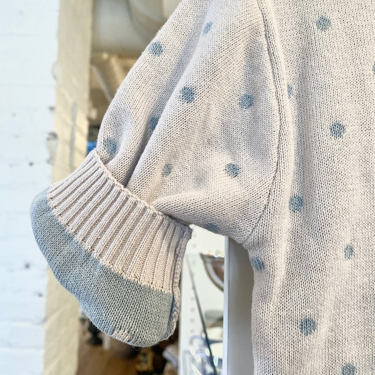 Cream patterned sweater with blue polka dots, newborn